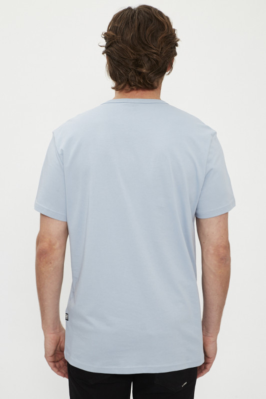 T-shirt Badge Artwork bleu ciel