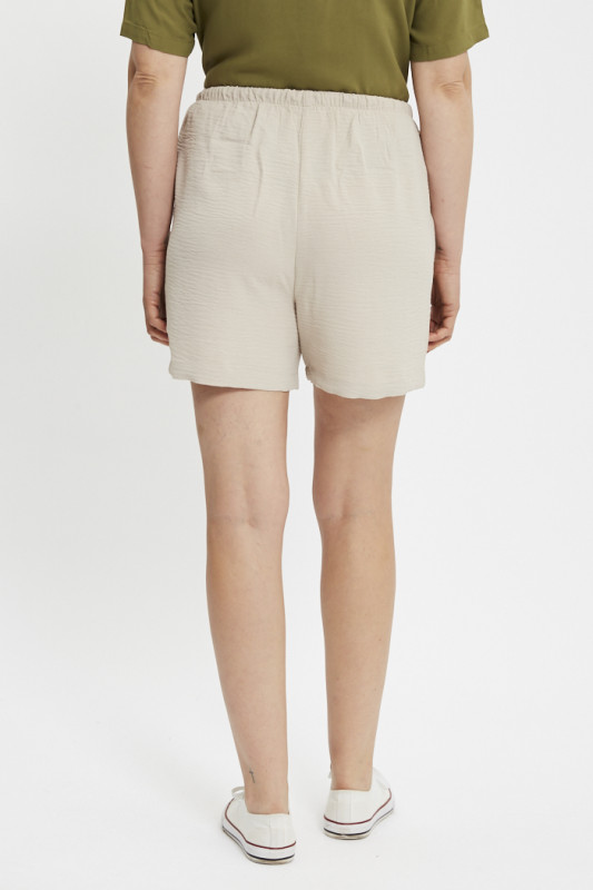 Short Lion taille haute beige femme