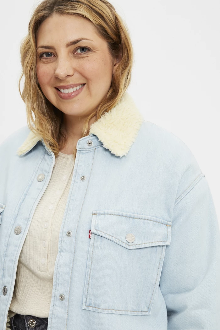 Jean Crosby slim en coton mélangé bleu indigo à effet délavé et rivets