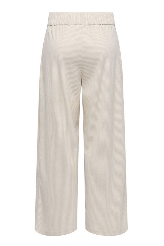 Pantalon en velours beige clair coupe loose femme
