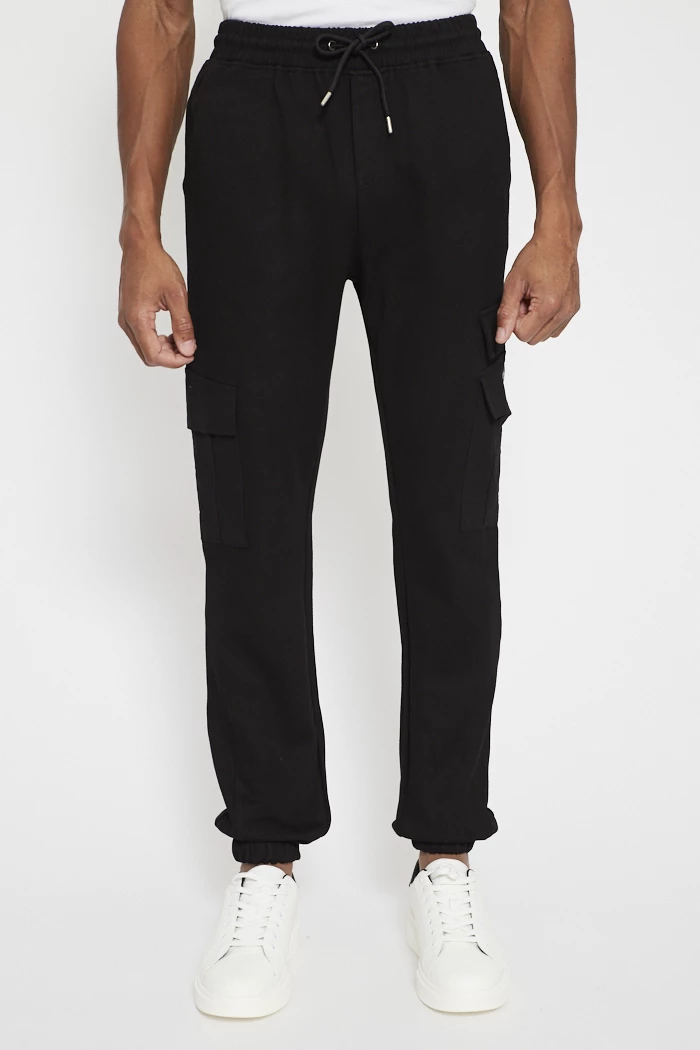 Jogging noir homme Canterbury Stretch Tapered Poly Knit | Espace des