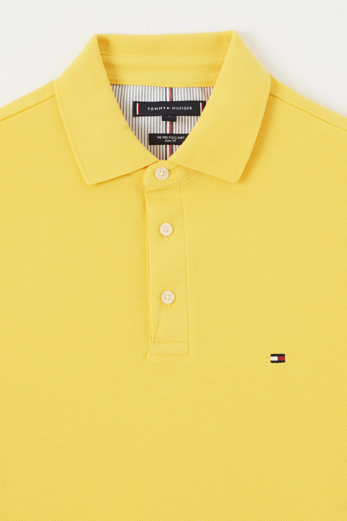 Polo Tommy Hilfiger en maille piquée de coton jaune à col polo et manches  bicolores | Rue Des Hommes